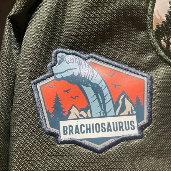 2023 BRAND NEW EDITION Universal studios GREEN Jurassic Park Backpack - Picture 7 of 16
